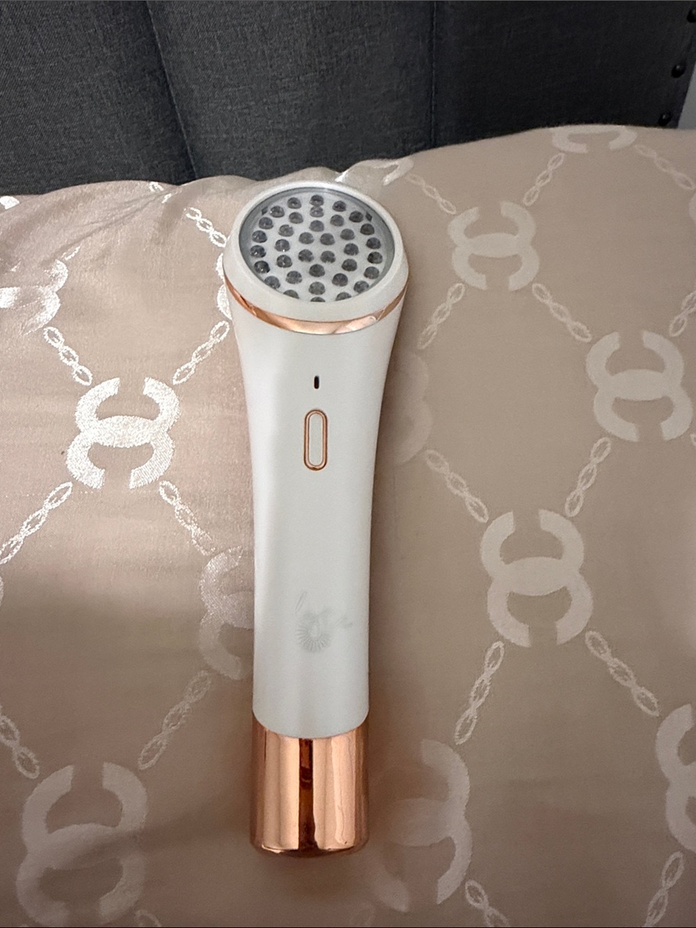 White and Rose Gold Handheld Beauty Device